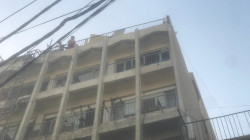 إنقاذ 20 نزيلاً بينهم أطفال حاصرتهم النيران داخل فندق وسط بغداد (فيديو+صور)