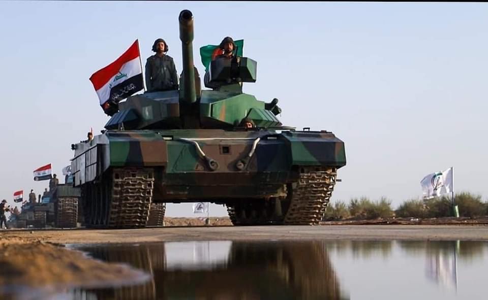 لأول مرة .. ظهور نسخة عراقية مطورة للدبابة (T-72) السوفييتية بإستعراض عسكري (صور)
