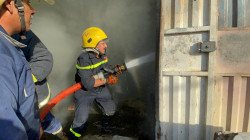 إخماد حريقين داخل موكب حسيني و"كوفي شوب" في كربلاء (صور)