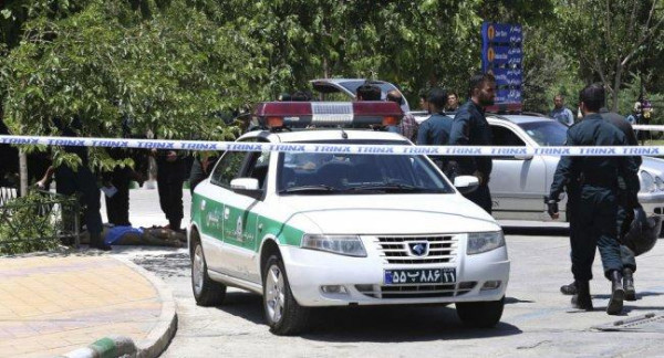 Two policemen killed in armed attack in Iran