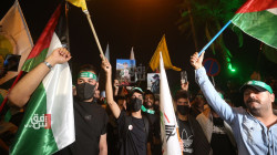 العشرات يتظاهرون قرب "معلق بغداد" تنديداً بإسرائيل ودعماً لفلسطين