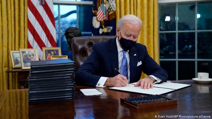 Biden signs new order to reduce AI risks