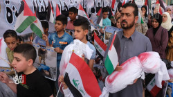 Solidarity protest in Baghdad: Iraqi and Palestinian flags wave in support of Gaza's children