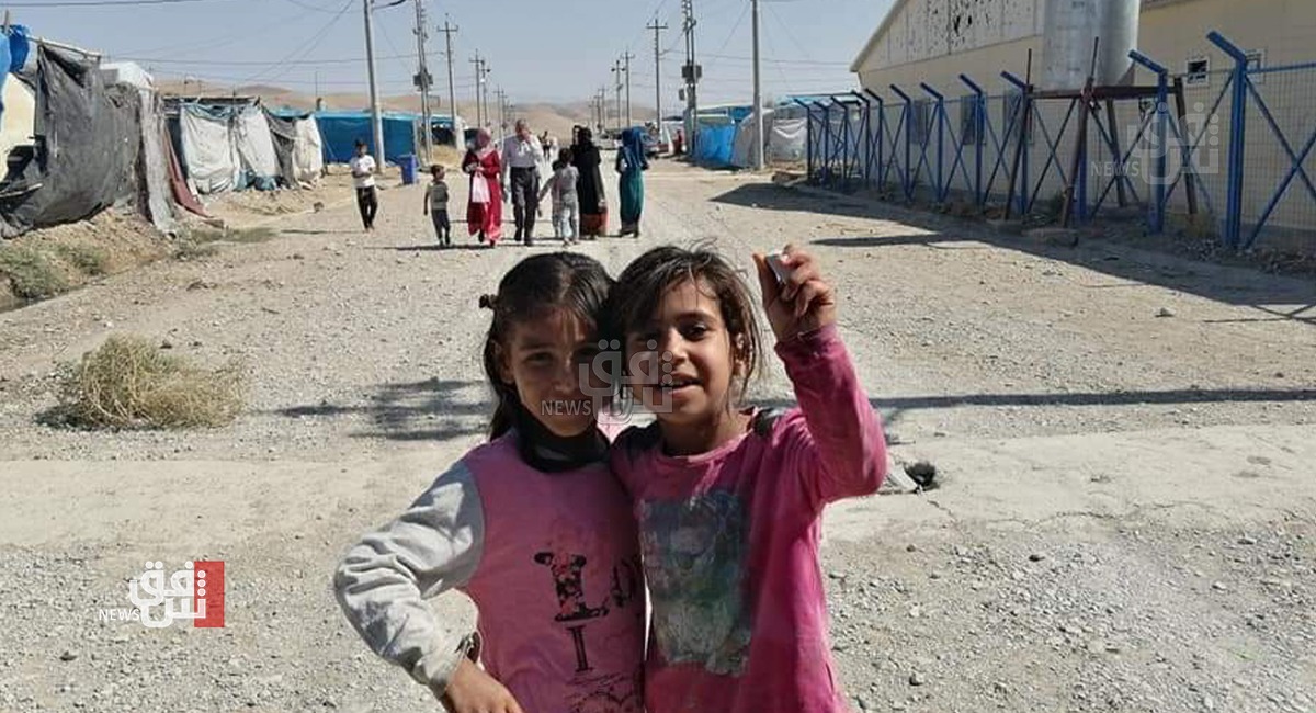 On their World Day... Iraqi children face the eye of the storm