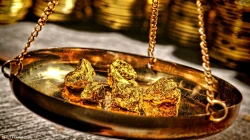PRECIOUS-Gold heads for weekly gain as Fed strikes dovish stance