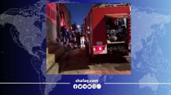 الدفاع المدني يكافح حريقا اندلع في مجمع سكني بالنجف