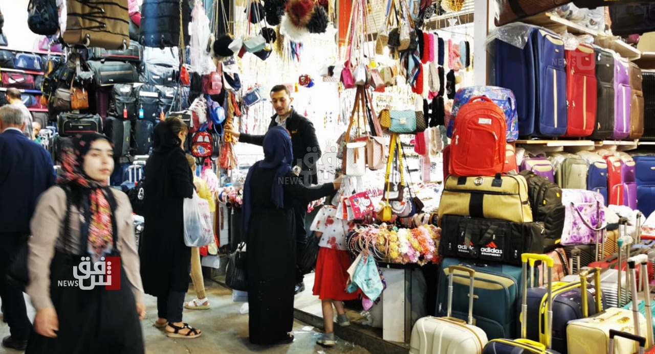 The late chill strikes "warm" clothing markets in Iraq