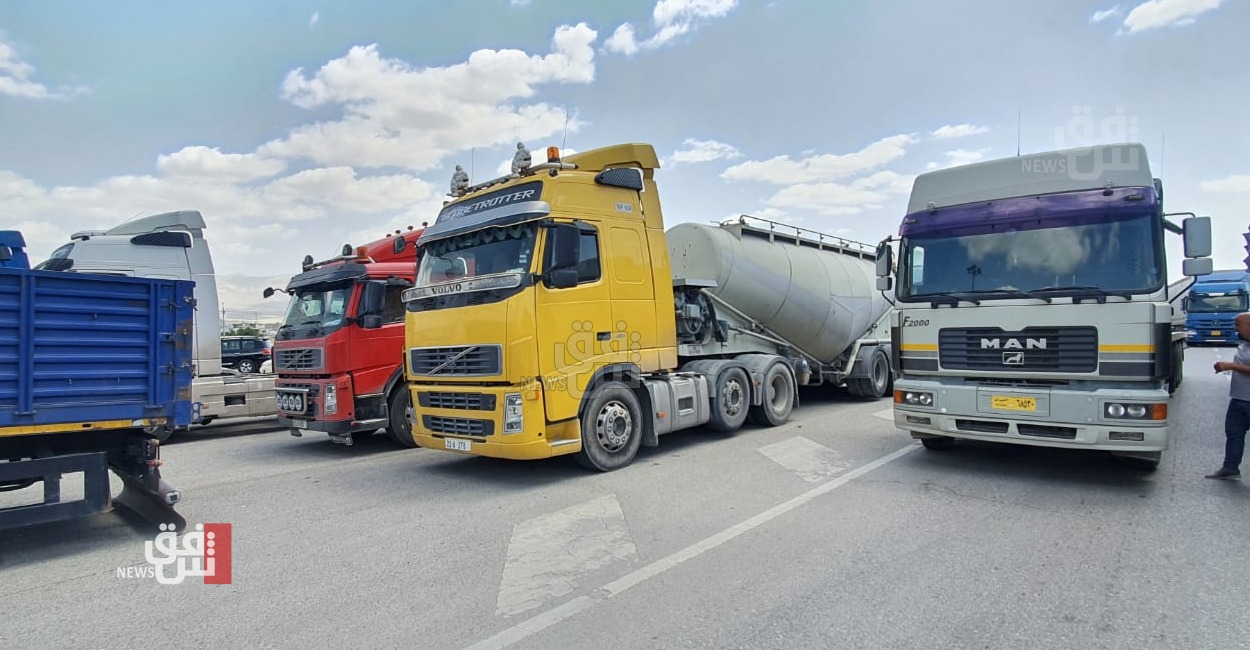 Truck drivers block an al-Sulaymaniyah main road in Protest