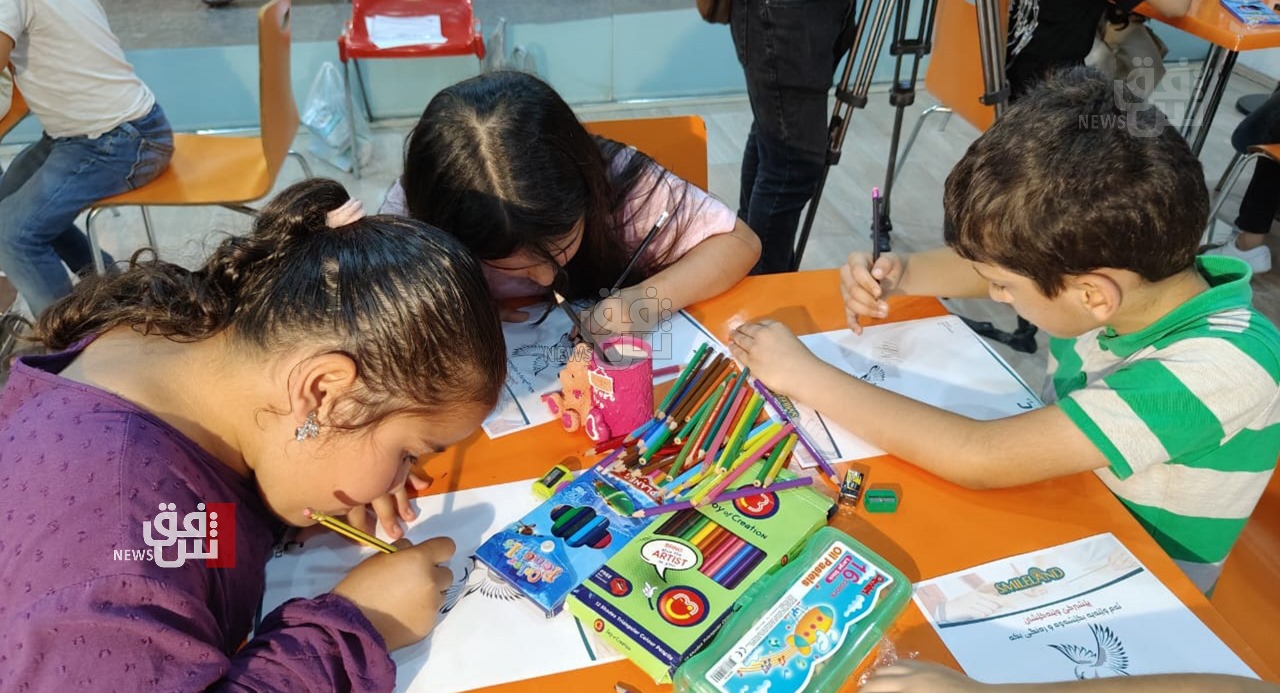"سمايلي لاند" تحتضن أطفال العراق بمسابقة رسم (صور)