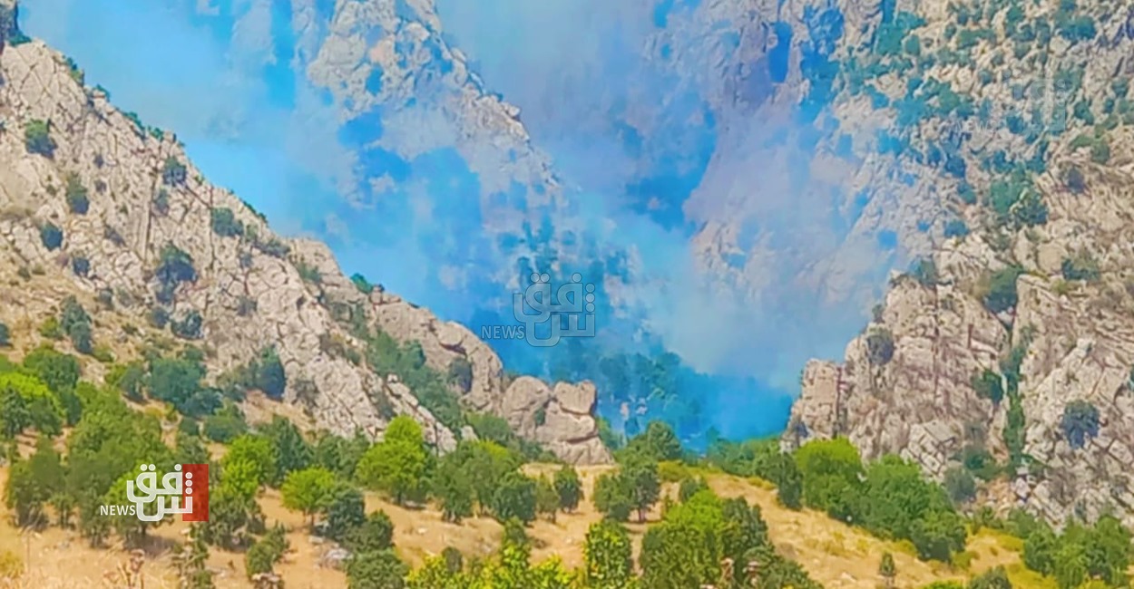 اندلاع حريق بأرض زراعية شمالي دهوك بسب قصف تركي (صور)