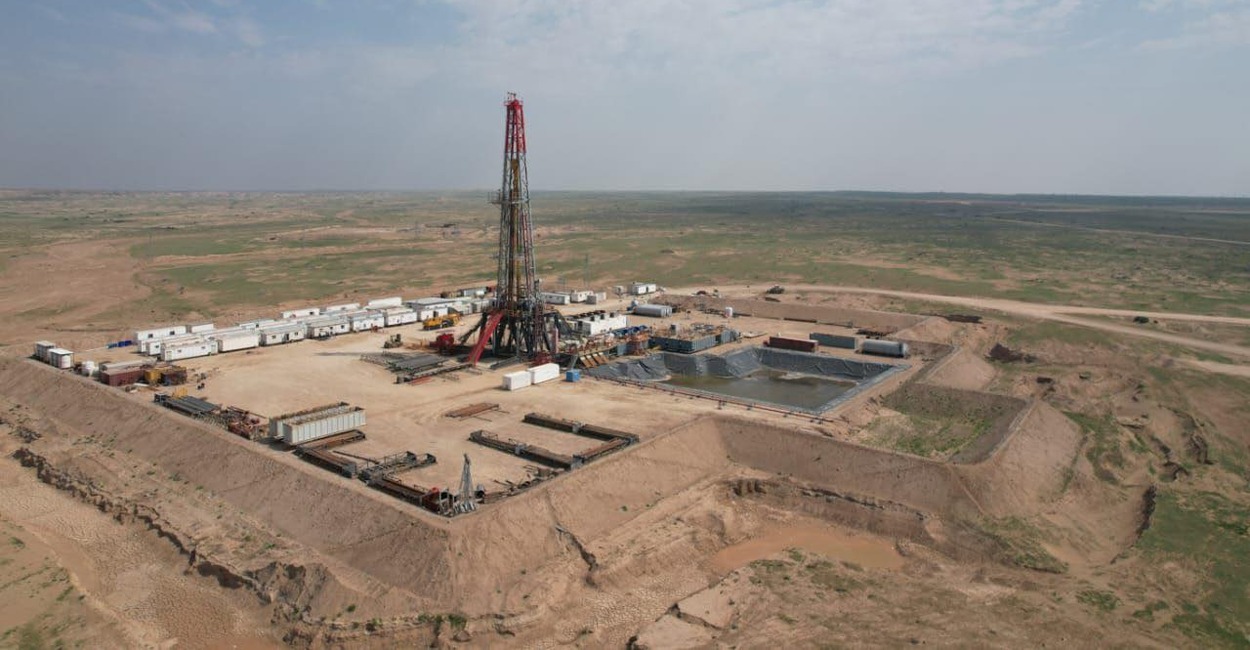 Iraq Drilling and development of over  oil wells in H