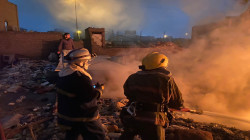 Firefighters extinguish blazes after a weapons depot explosion in Baghdad: source