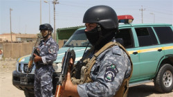 Masked gunman kills Iraqi police officer in a drive-by shooting