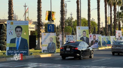 Candidates hit the streets: Erbil's election campaign posters are displayed