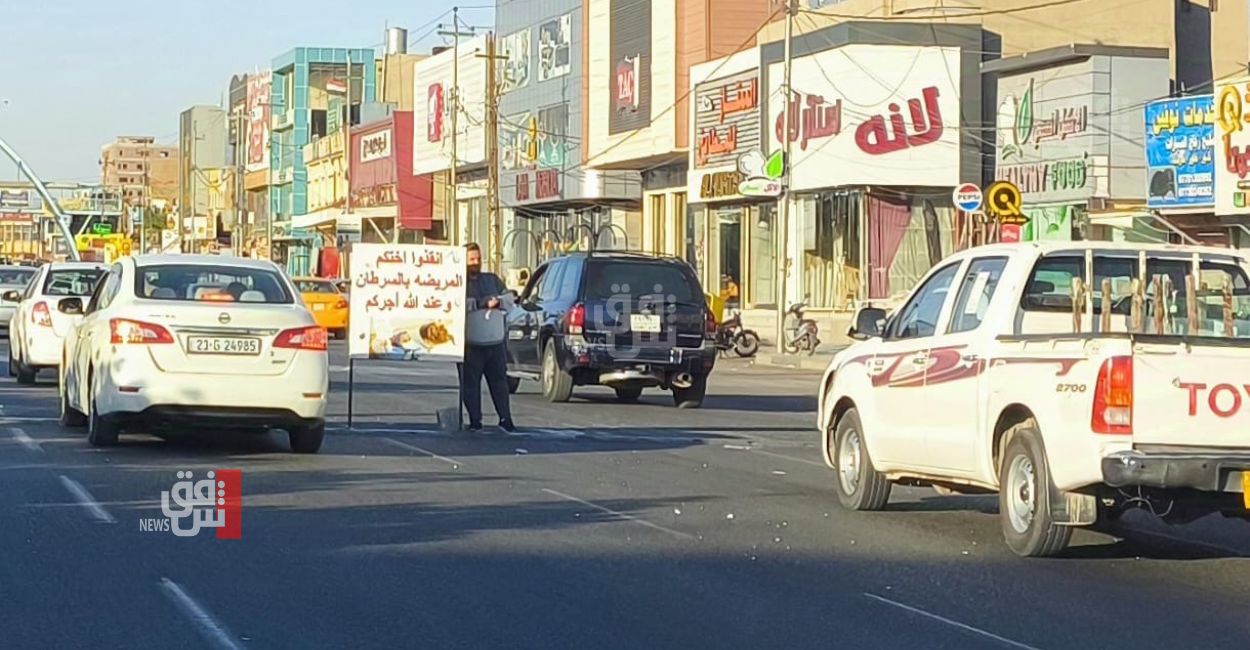 "أنقذوا مريضنا".. نداءات في التقاطعات وصناديق تبرعات متهمة بـ"الاستجداء الإنساني" في كركوك