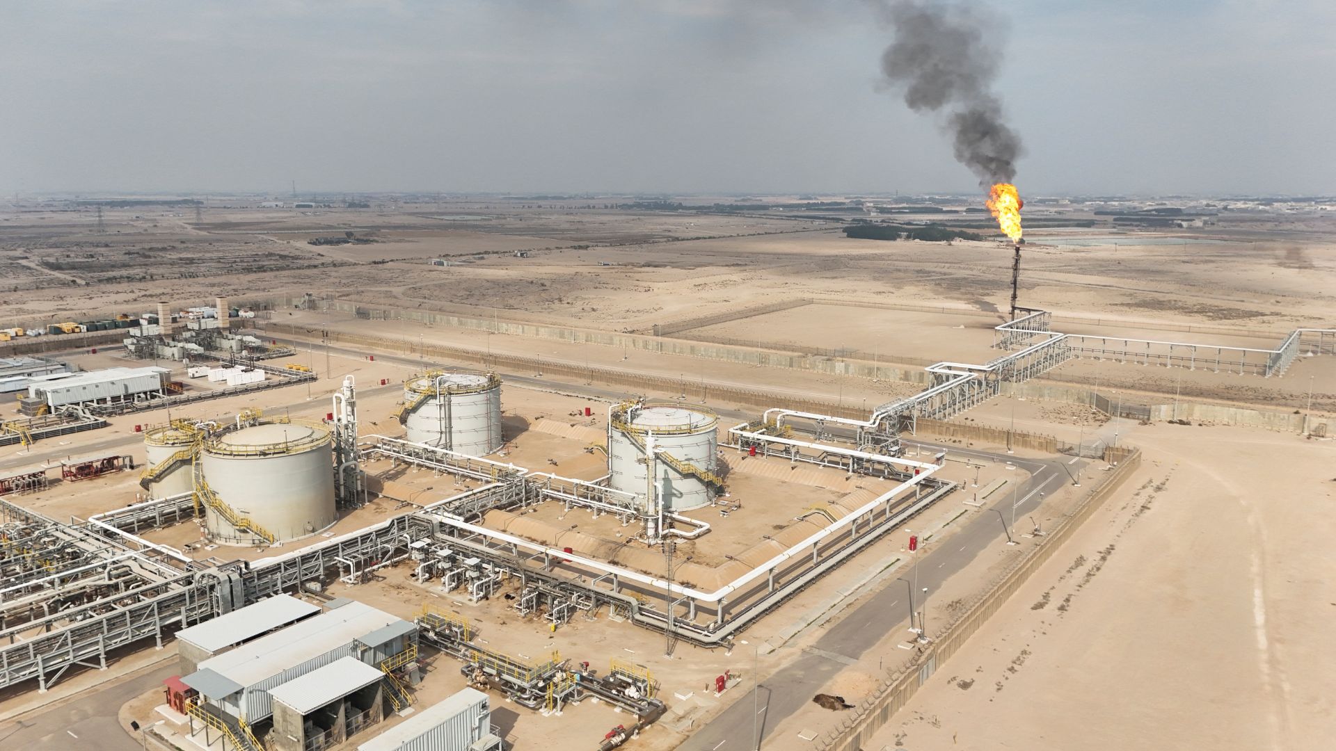 Iraq's gas flaring paradox: a wealth of resources, a nation in need