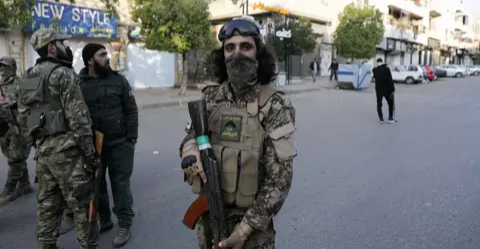 Chechen fighters take over security in Syrian Alawite village