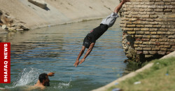 Scorching Iraq: Al-Husseiniya River offers escape from extreme heat