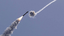 Israel warns of strikes on Tehran after reporting rockets from Iran