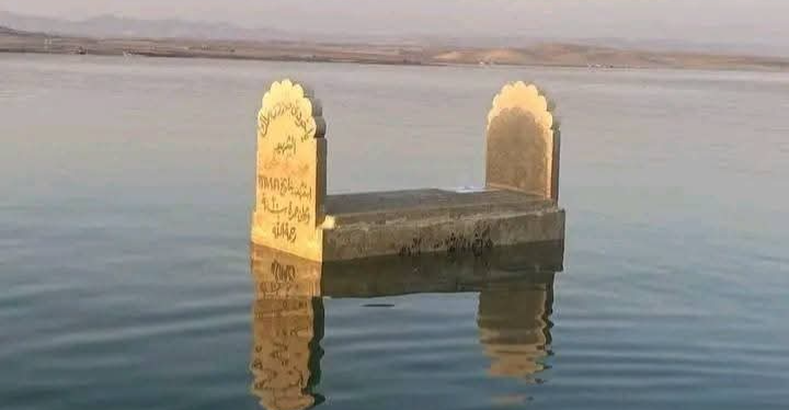 Yazidi graves emerge from Mosul Dam’s receding waters