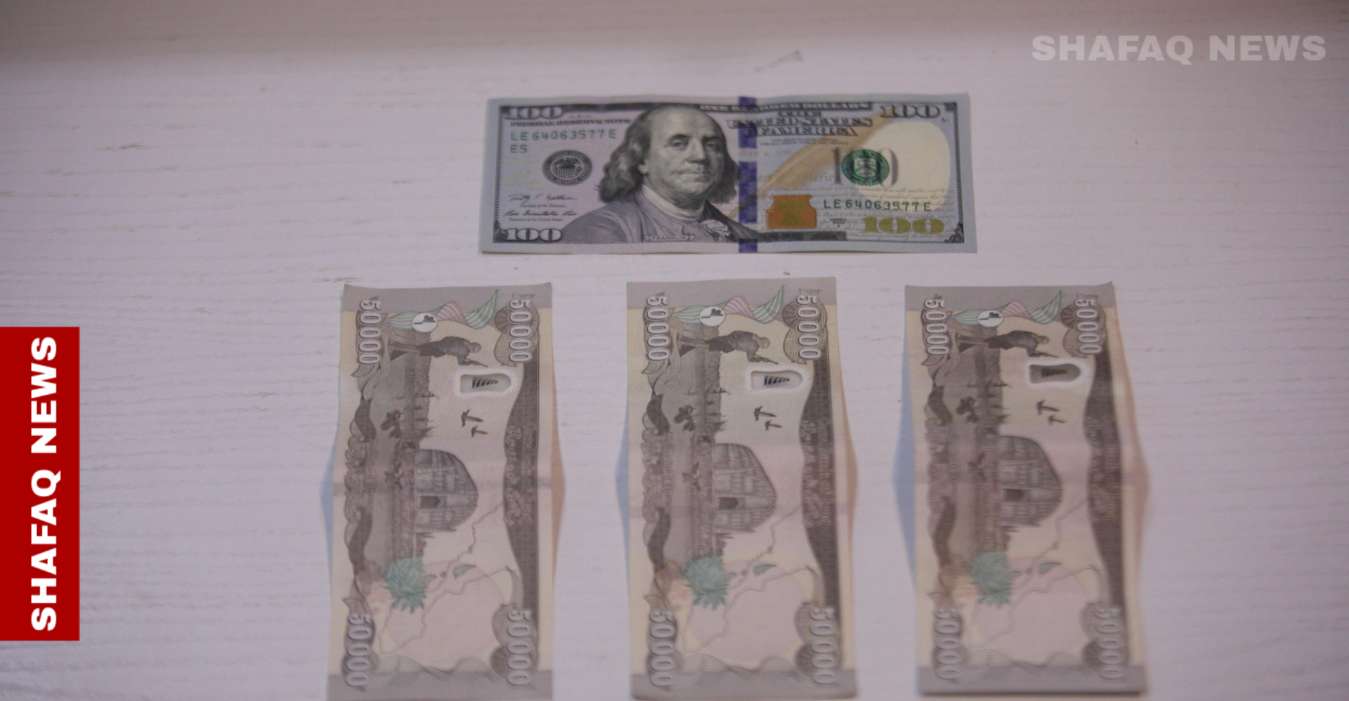 Dollar prices slip in Baghdad, climb in Erbil