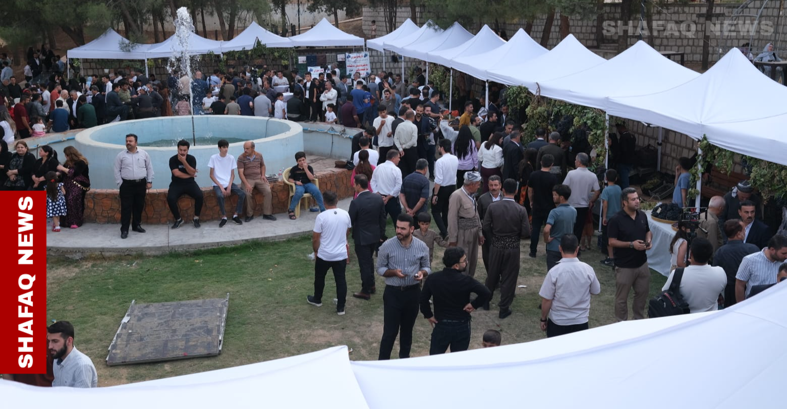 مشاركة واسعة من المزارعين في مهرجان للعنب والمنتجات المحلية في رواندوز (صور)