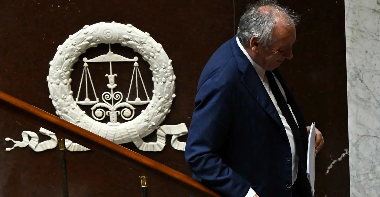 French parliament topples government over debt plan