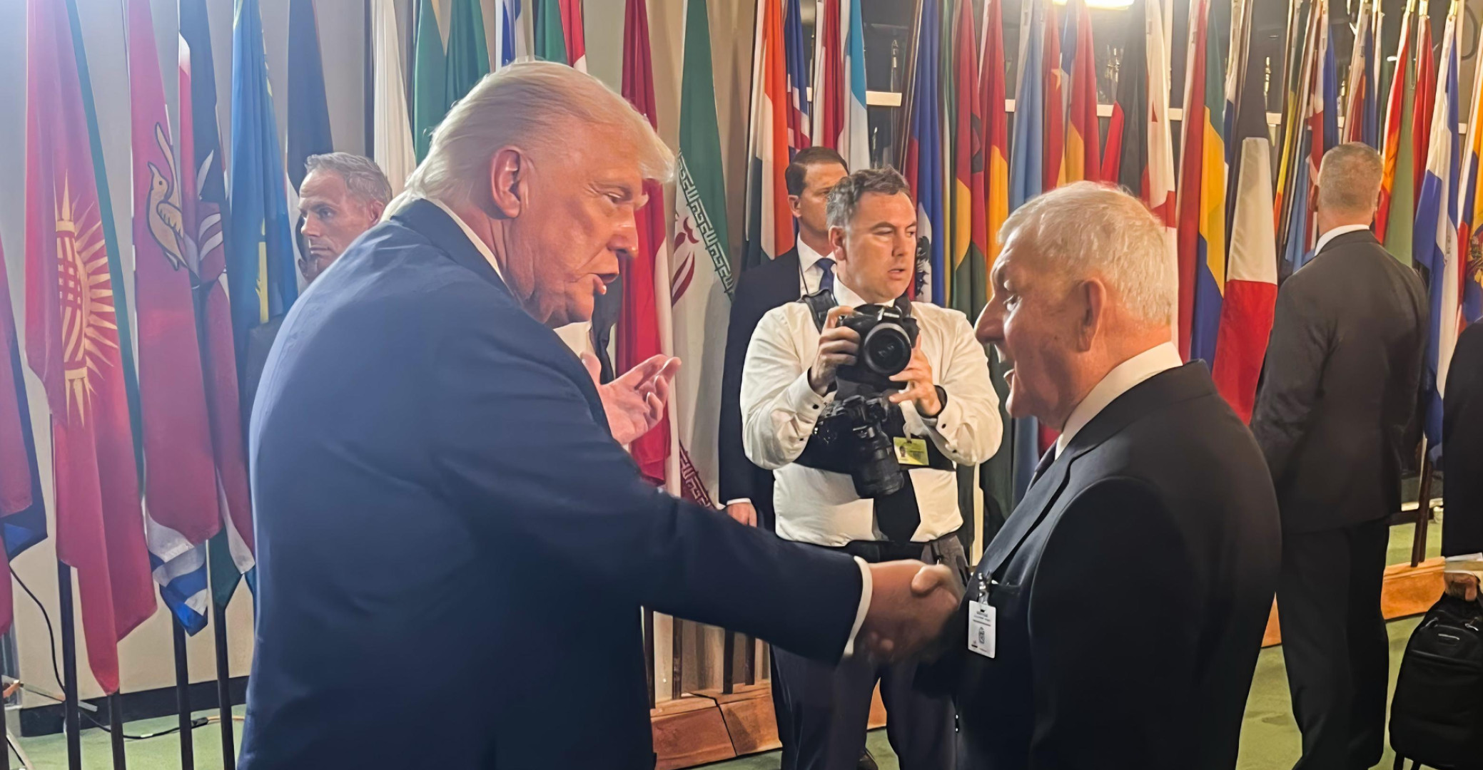 In front of the cameras... a warm handshake between Rashid and Trump