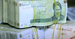 Iran’s currency falls to record low against dollar