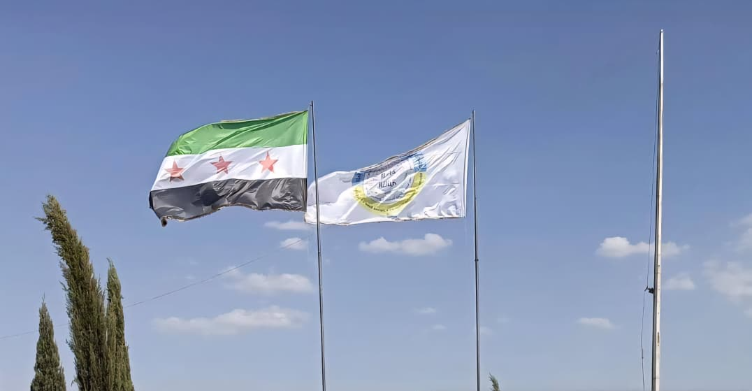 For the first time: Kurdish-led AANES raises new Syrian flag