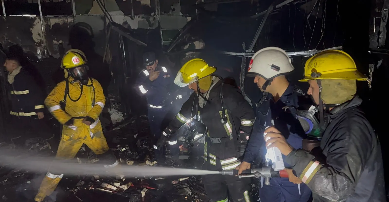 ئاگر گەورەیگ بینایگ بازرگانی لە نەجەف سزنێد