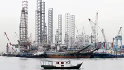 Crude holds ground ahead of US–China trade outcome
