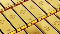 Gold rises as dollar retreats from four-month high