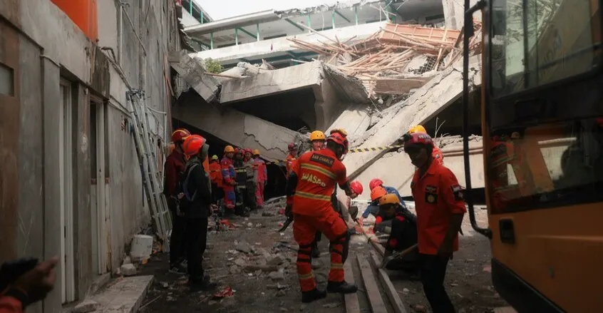 Indonesia landslide kills 11 with dozens missing