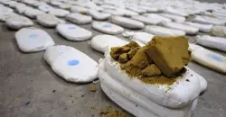 الأمن العراقي يطيح بشبكة دولية لتجارة المخدرات في الأراضي السورية