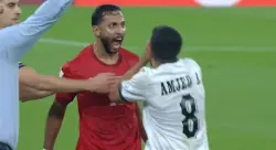"فيفا" يوقف لاعب البحرين ويغرمه مالياً بعد اعتدائه على امجد عطوان