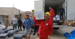 الهلال الأحمر العراقي يوزع مواد غذائية واغاثية لمتضرري السيول في السليمانية وكركوك