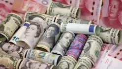 Pound drops as UK economy shrinks