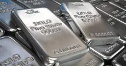 Record silver retreats 3% and platinum surges to 12-year high
