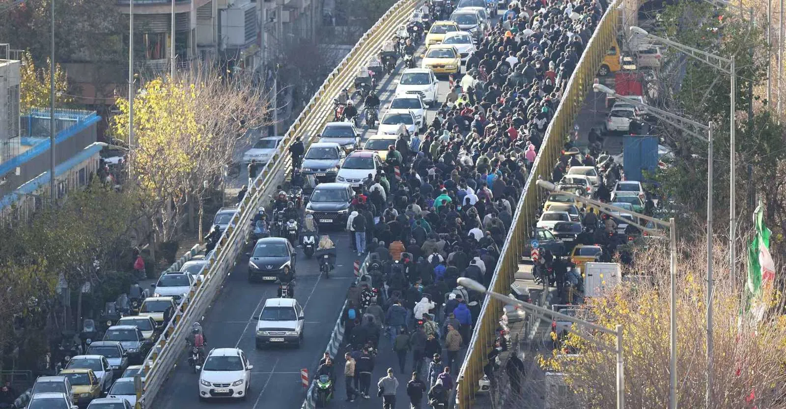 Iran suspends official work in 21 provinces as protests enter third day