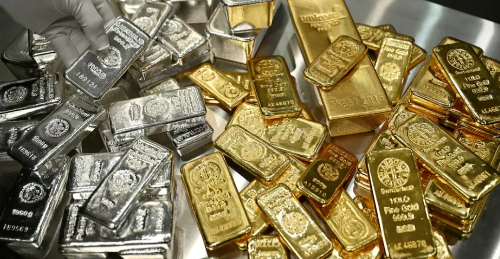 Precious metals surge to historic milestone