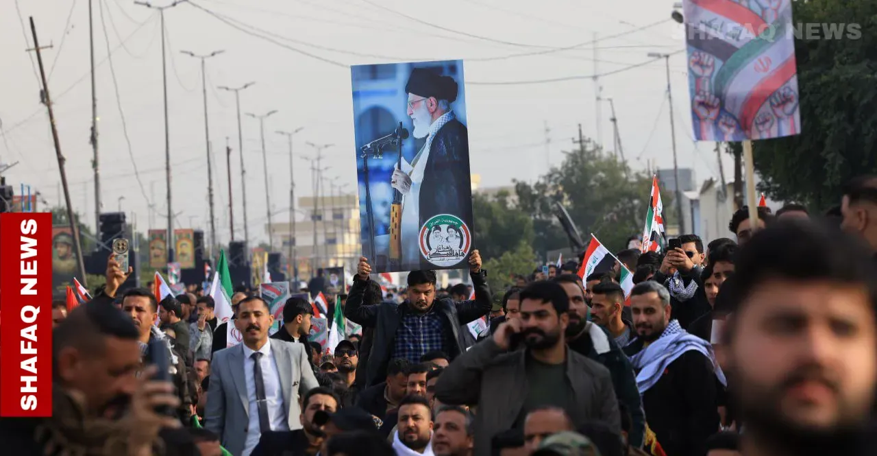 Iraqi faction supporters rally in Baghdad in solidarity with Iran
