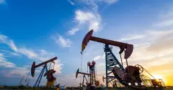 Oil holds near two-month highs as US outages and Iran tensions offset surplus fears