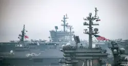 US military presence signals strategic pressure over direct conflict