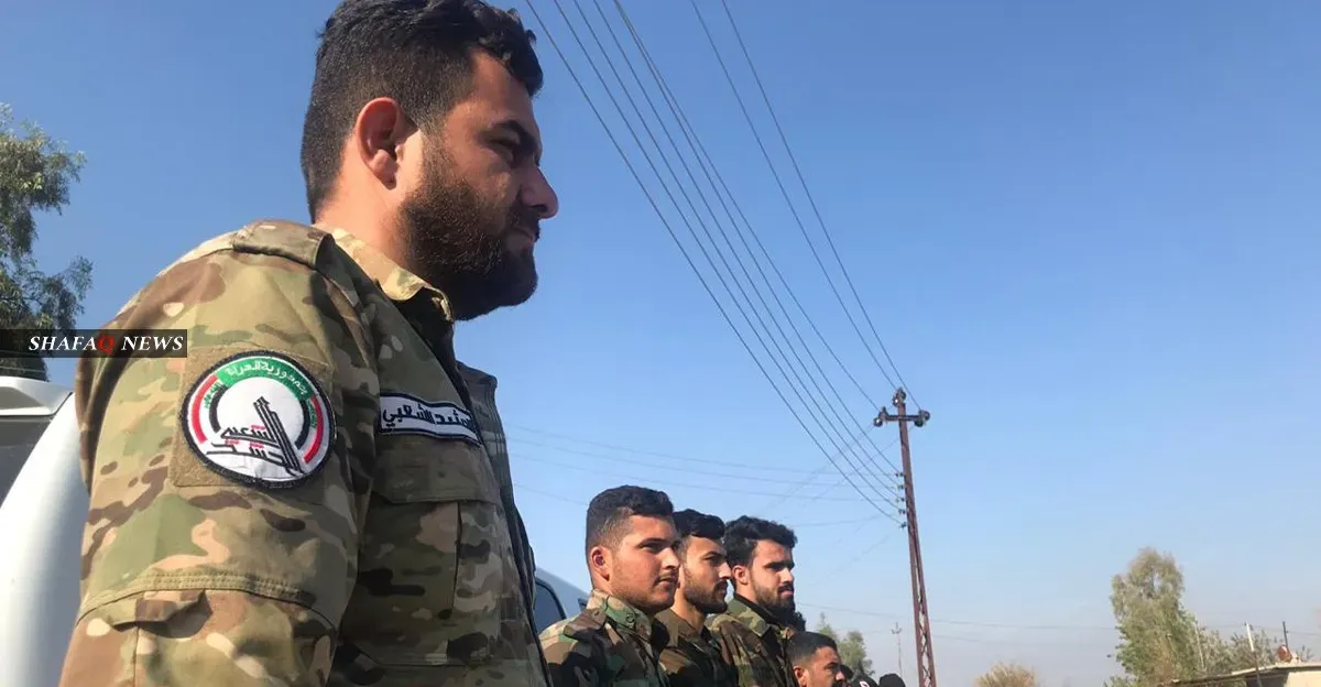 حەشد شەعبی یەکیگ لە ئەندامەیل حزب بەعس لە موسڵ گرێد