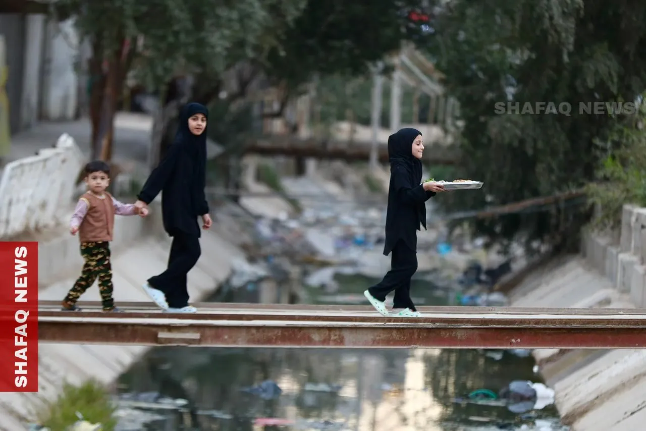 أهالي بابل يحيون روح الكرم الرمضاني بتبادل موائد الإفطار (صور)