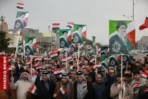 Dozens rally in Baghdad district expressing support for Iran