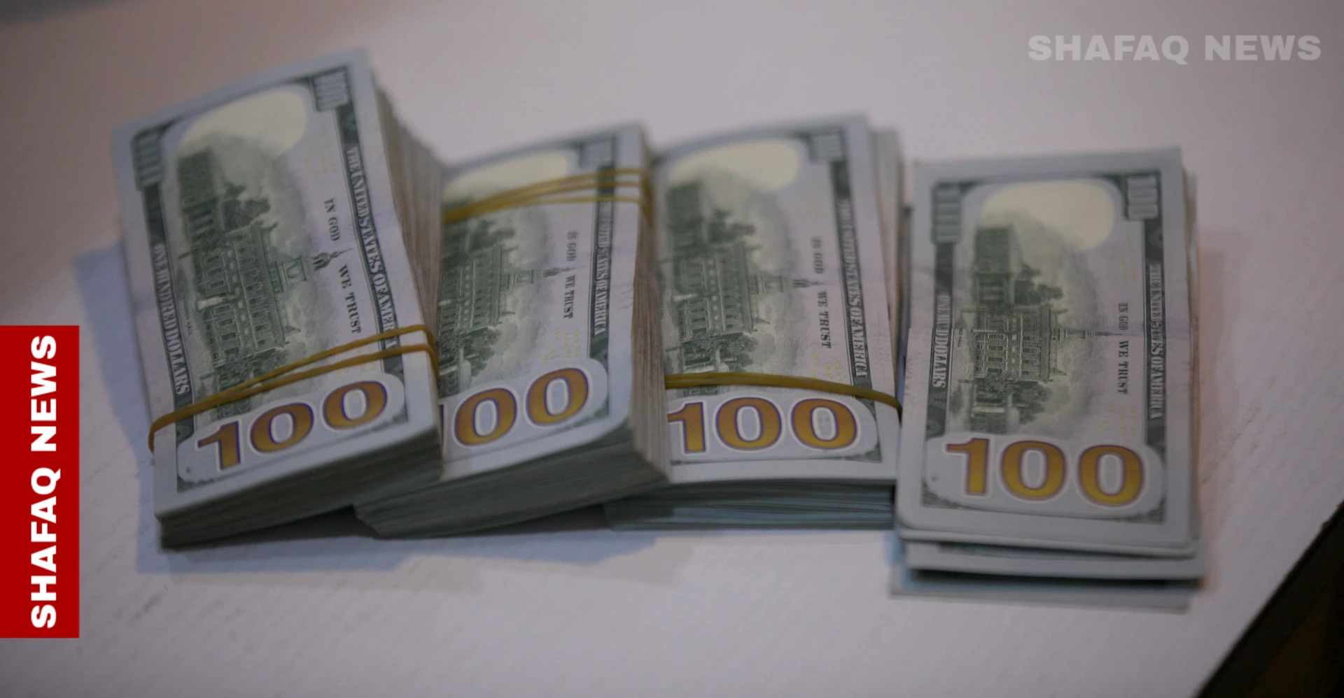 "تعليق الدولار".. معهد أميركي يقترح ضغوطاً أمنية ومالية على العراق