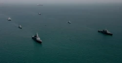 Iran warns US ships risk same fate as bases