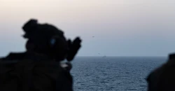 US orders Iranian vessels back, UN urges parties to open Hormuz